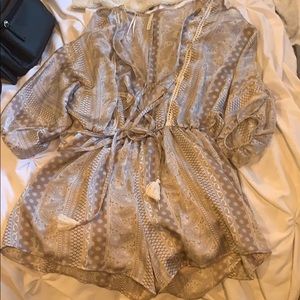 Romper with open shoulder